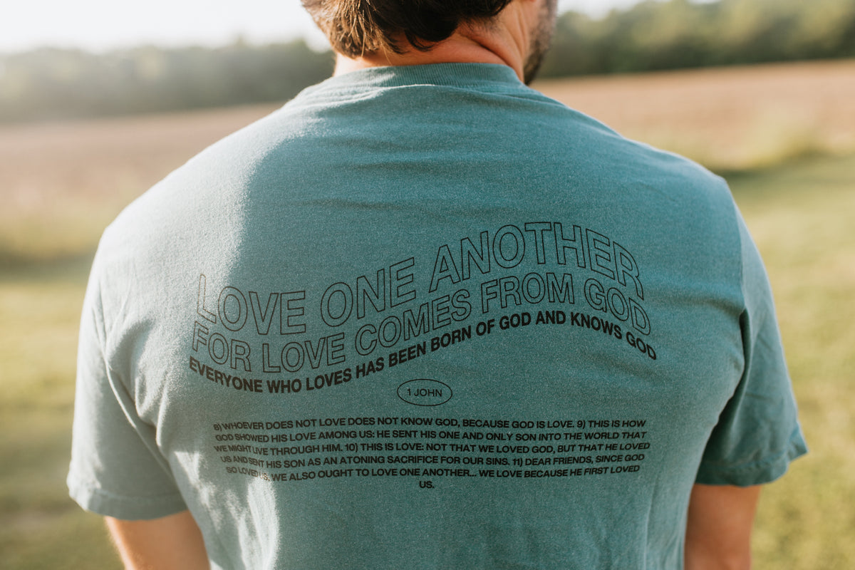 LOVE ONE ANOTHER - HEAVYWEIGHT COMFORT COLORS T-SHIRT
