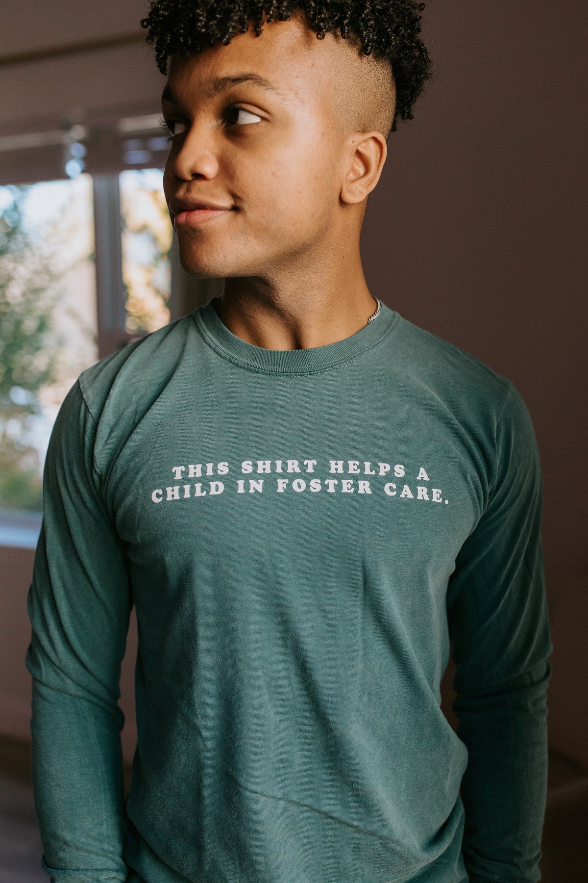 THIS SHIRT HELPS A CHILD IN FOSTER CARE - COMFORT COLORS LONG SLEEVE TEE