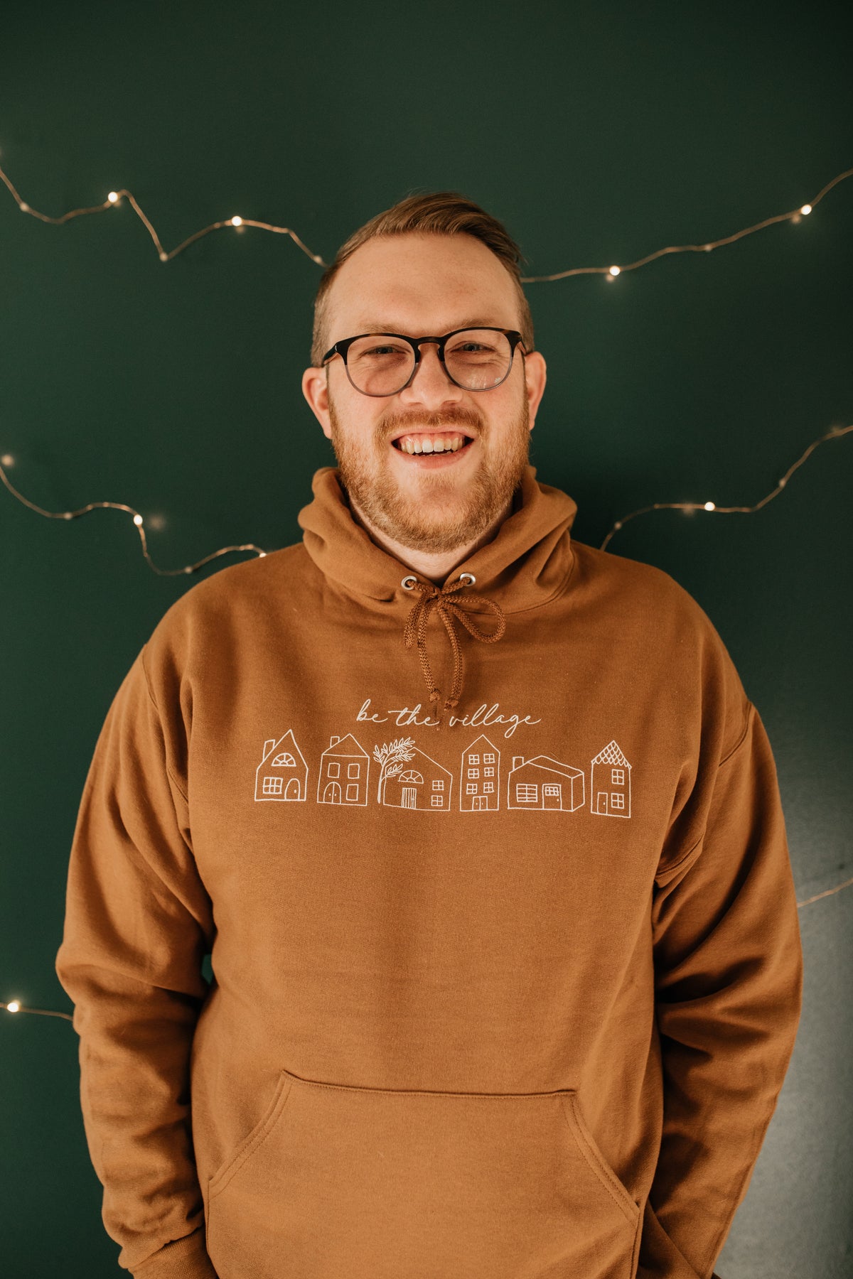 BE THE VILLAGE - CUDDLE UP HOODIE